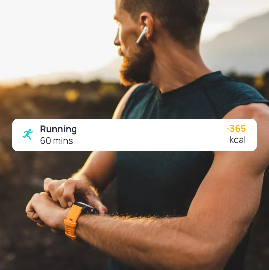 A man wearing a watch and headphones with an imported exercise entry from Cronometer.